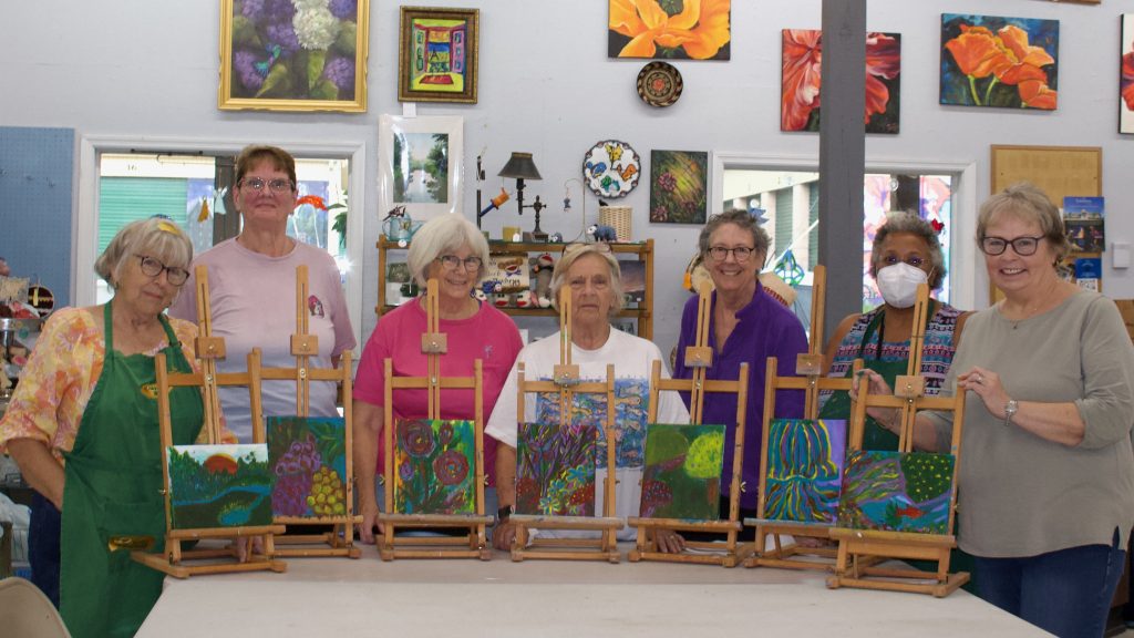 The painters who participated in the first Paint 'n Pass painting experience